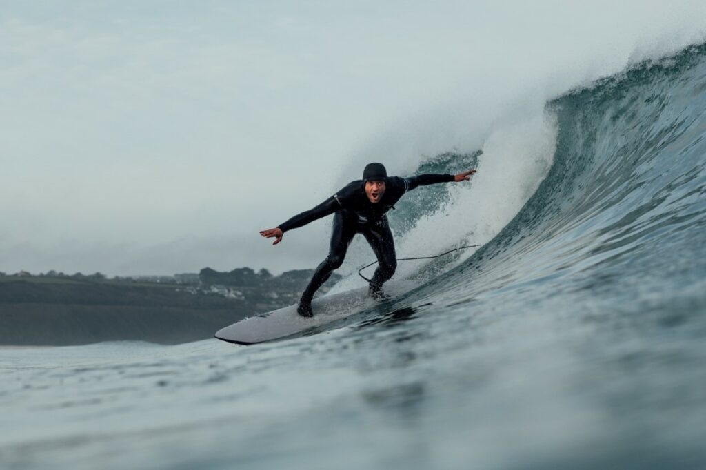 Hugo Tagholm surfing in Cornwall