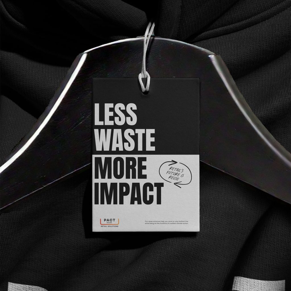 Image of clothing swing tag on a hanger with the words 'less waste, more impact'